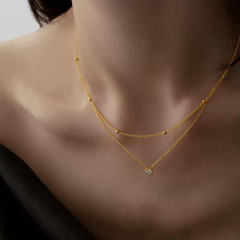 Titanium Double-Layer Necklace with Single Diamond Beads & Gold Accents, Adjustable Chain, Hypoallergenic Design, Comfortable for Daily Wear audrey necklace stacks